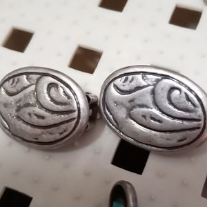 Silver Plate?  clip on vintage earrings signed By Artist.